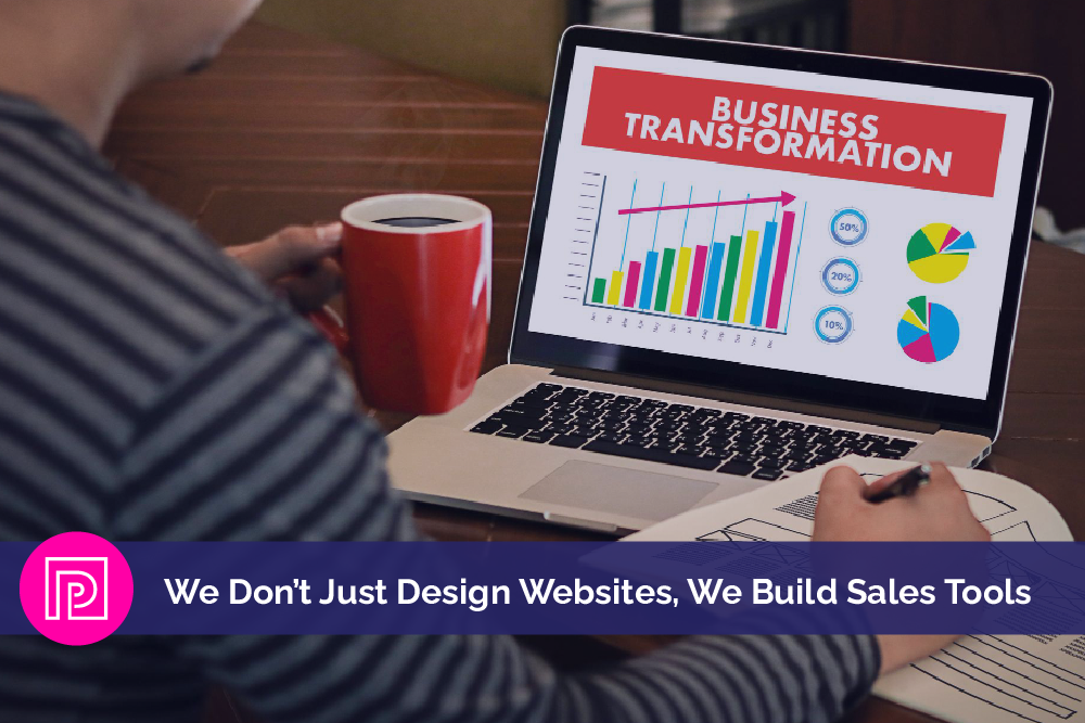 Laptop showing business growth charts illustrating websites built as sales tools for conversion and revenue